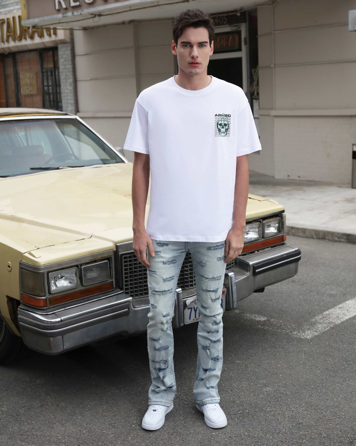 Light Wash Blue Flared Jeans with Cut-to-Shape Ripped