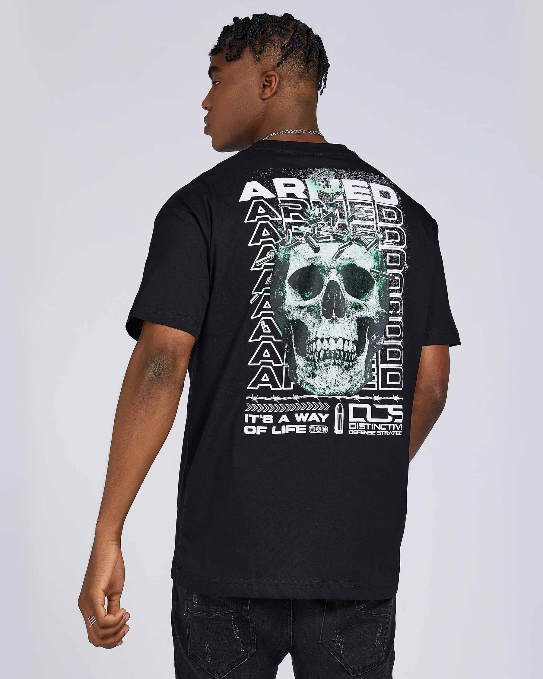 T-Shirts with Green Skull Graphic, Repeated "ARMED" Letters, and Bullet