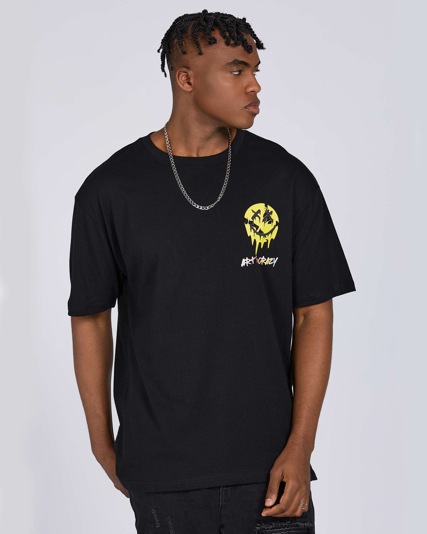 Camiseta con gráfico de cara sonriente derretida, tipografía y cita