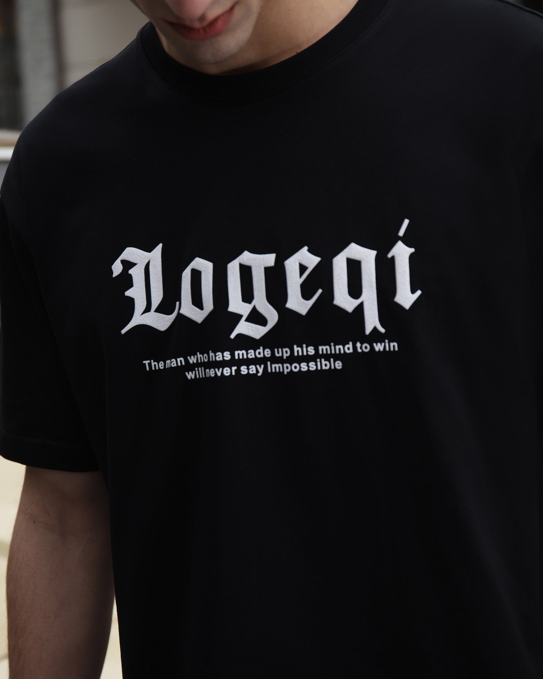 Graphic Tee With Black & White Tiger Head,  "LOGEQI" Lettering, and Quote