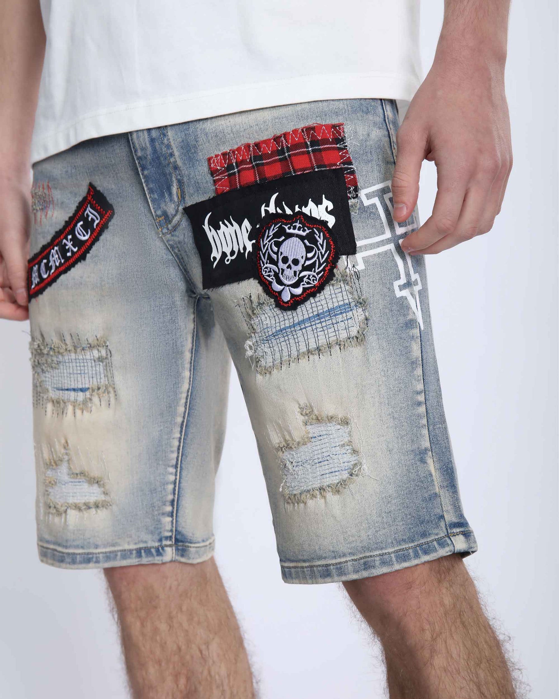 Distressed Denim Shorts with Gothic Skull Badge