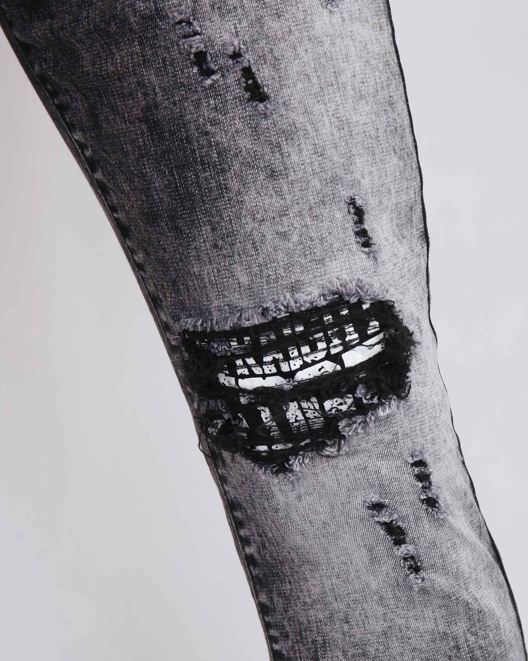 Irregular Wash Ripped Black Jeans with Black Patches