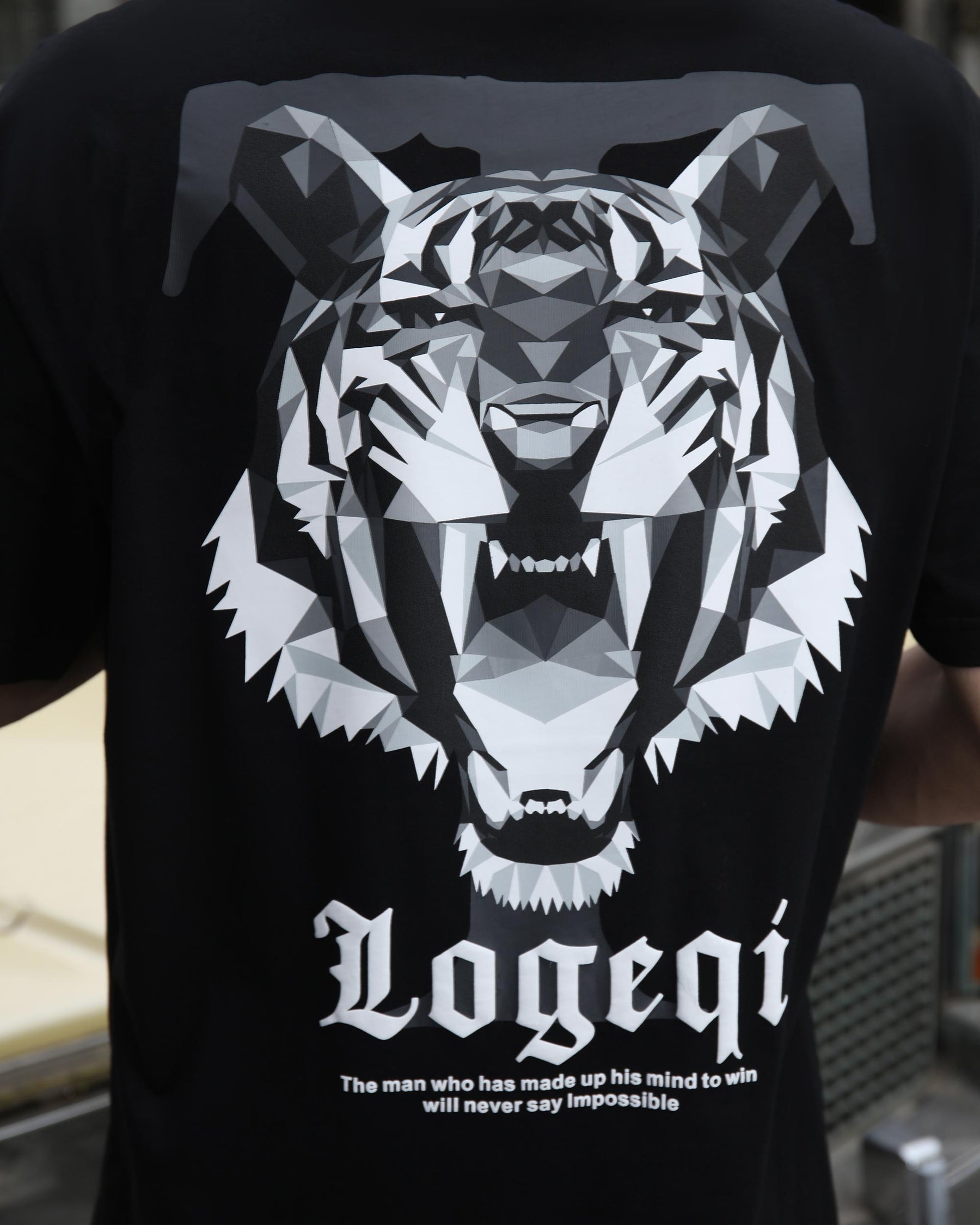 Graphic Tee With Black & White Tiger Head,  "LOGEQI" Lettering, and Quote