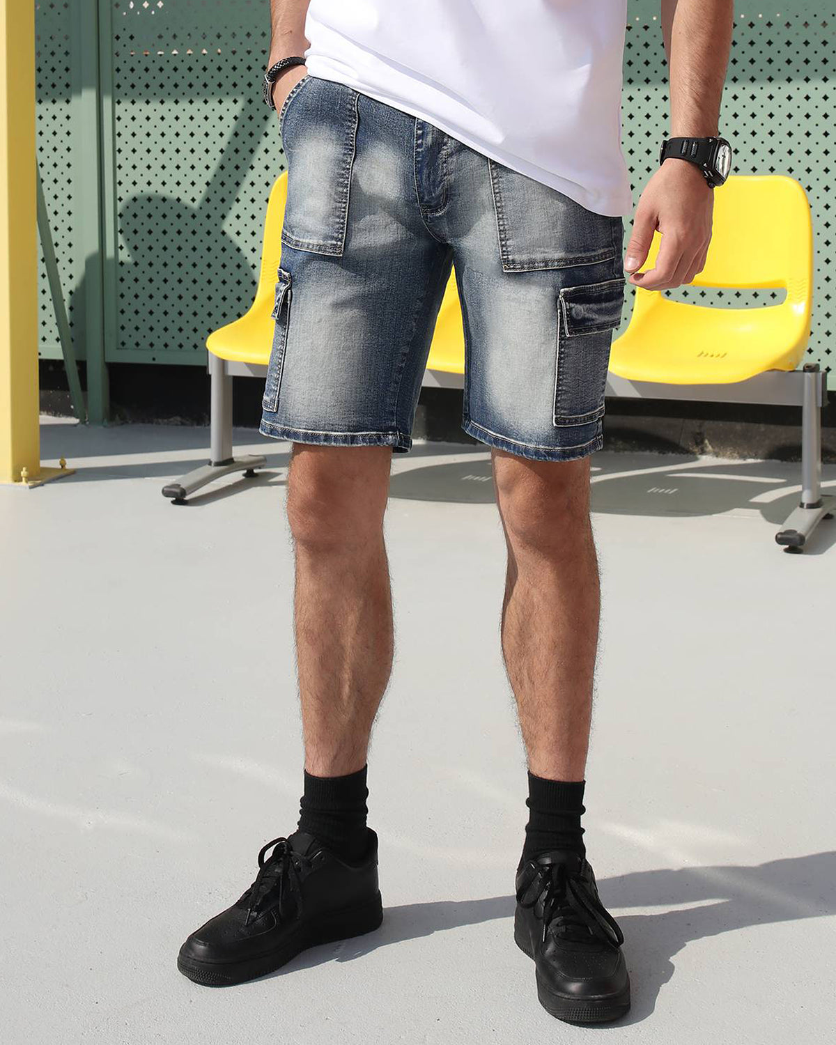 LOGEQI's blue distressed cargo denim shorts with 2 front cargo pockets, 2 side pockets, and distressing details on the thighs