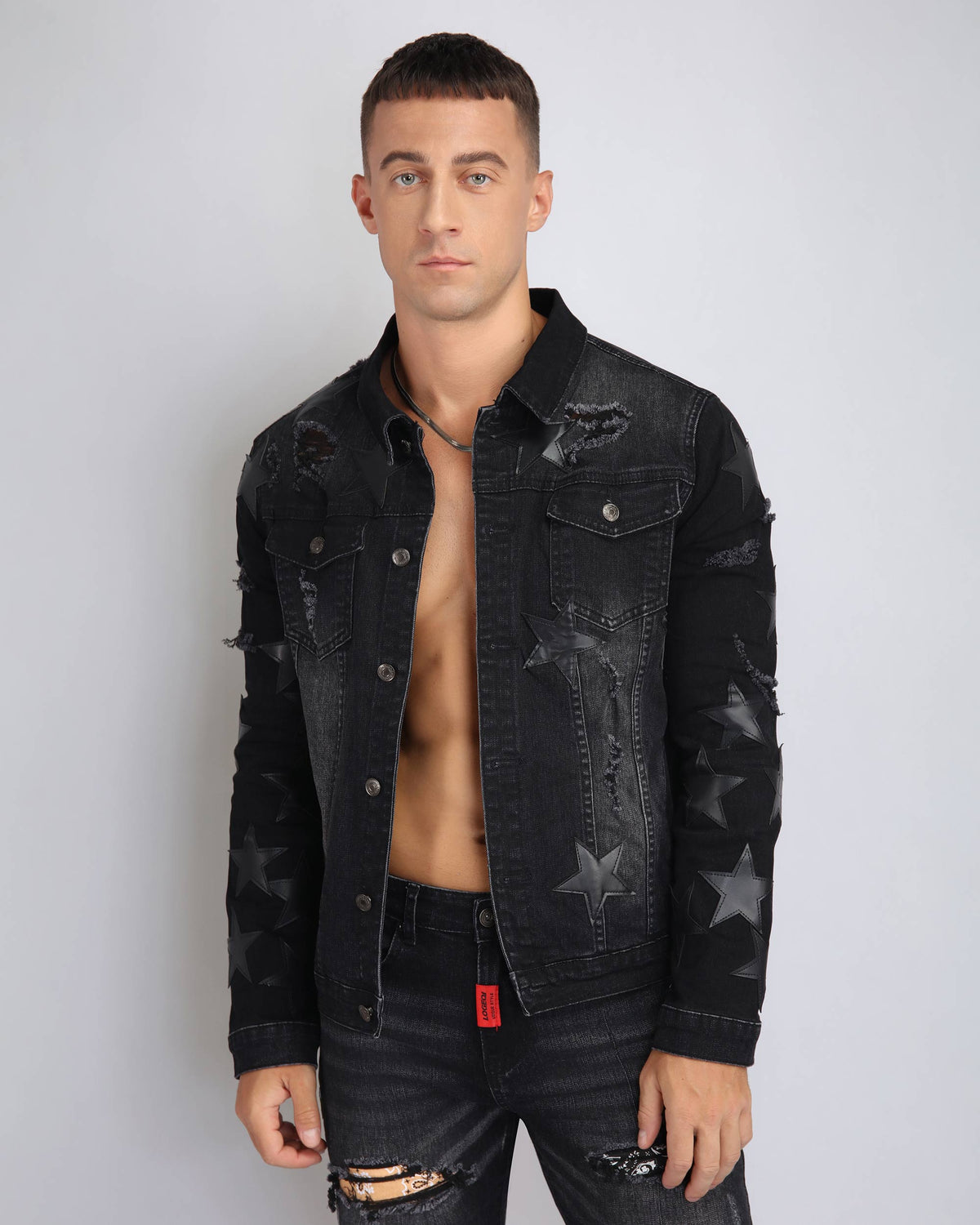 Ripped Black Denim Jacket with Star Patches