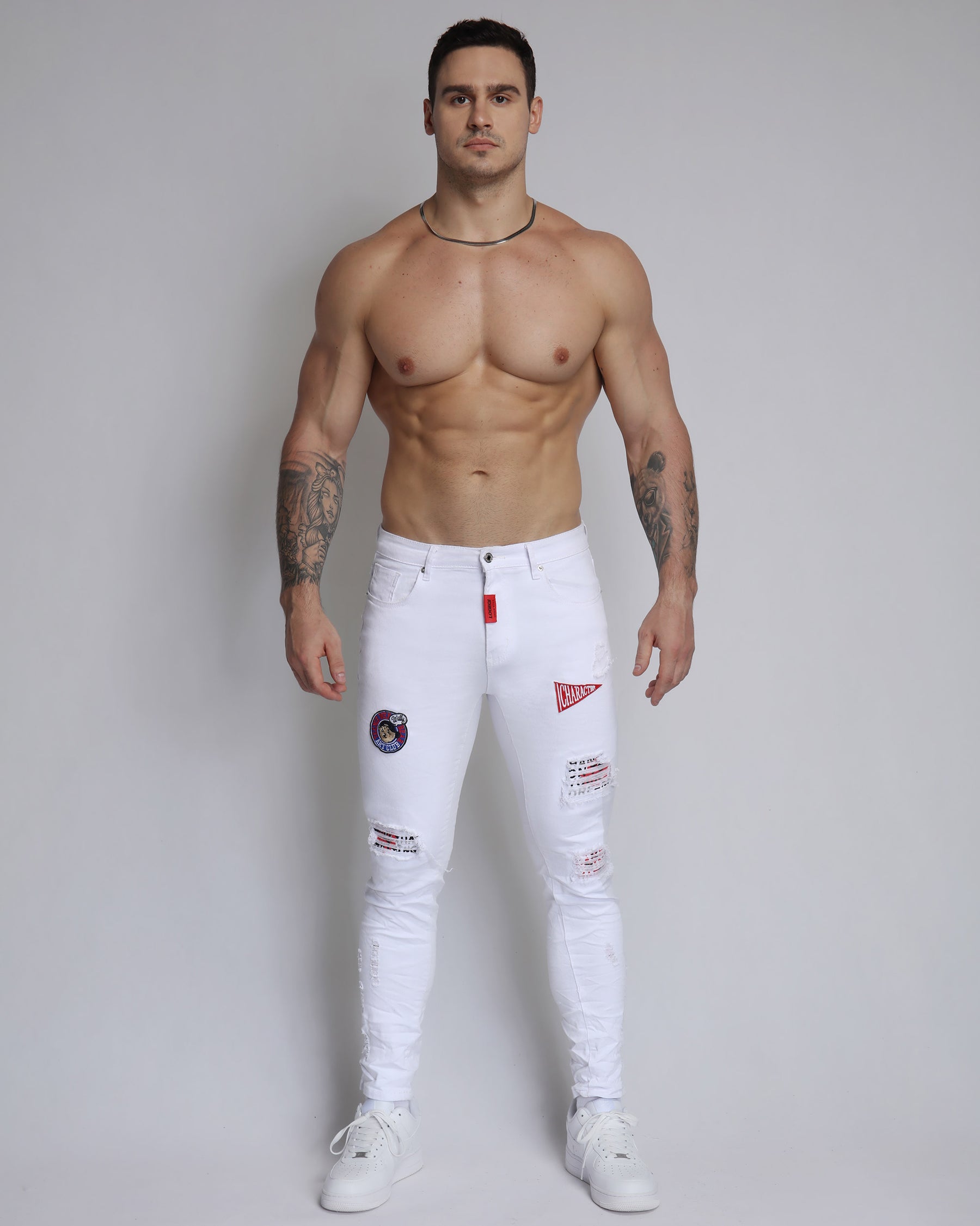 Trendy White Ripped Jeans with Badge