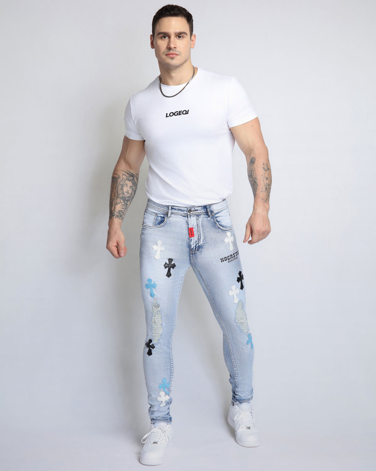 Trendy Distressed Blue Jeans with Ripped Knees & Patches