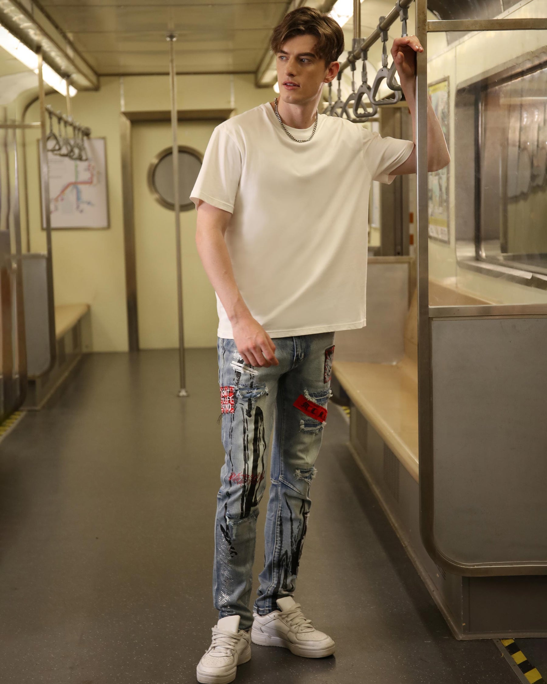 Logeqi Medium Wash Blue Ripped Jeans with Gothic Flair