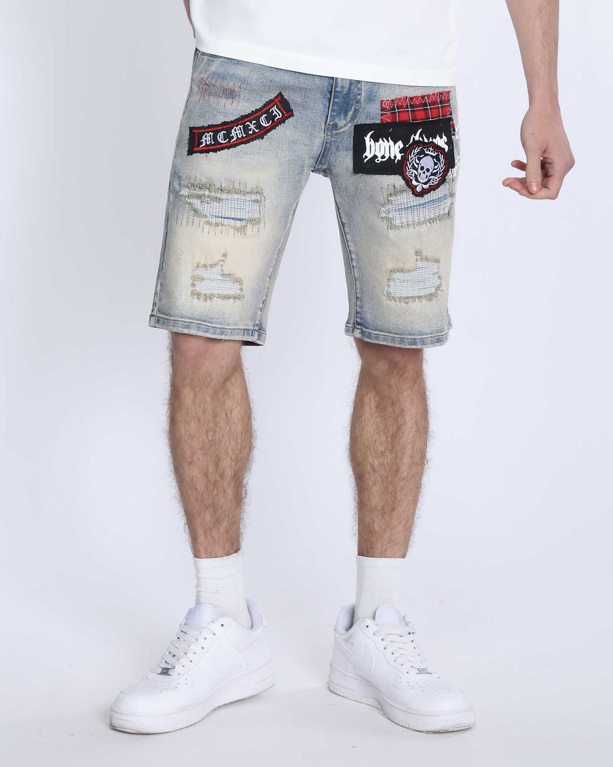 Distressed Denim Shorts with Gothic Skull Badge