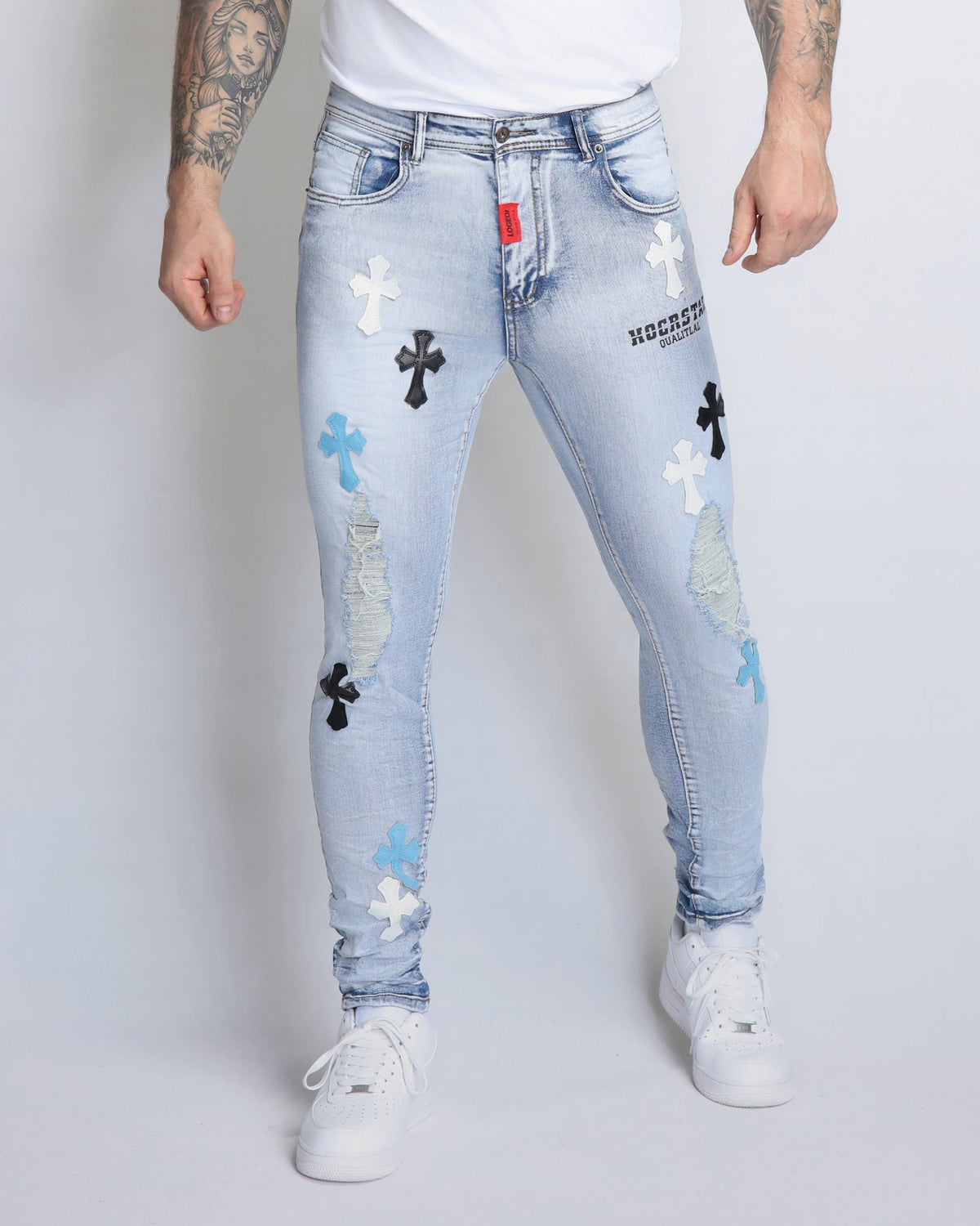 Trendy Distressed Blue Jeans with Ripped Knees & Patches