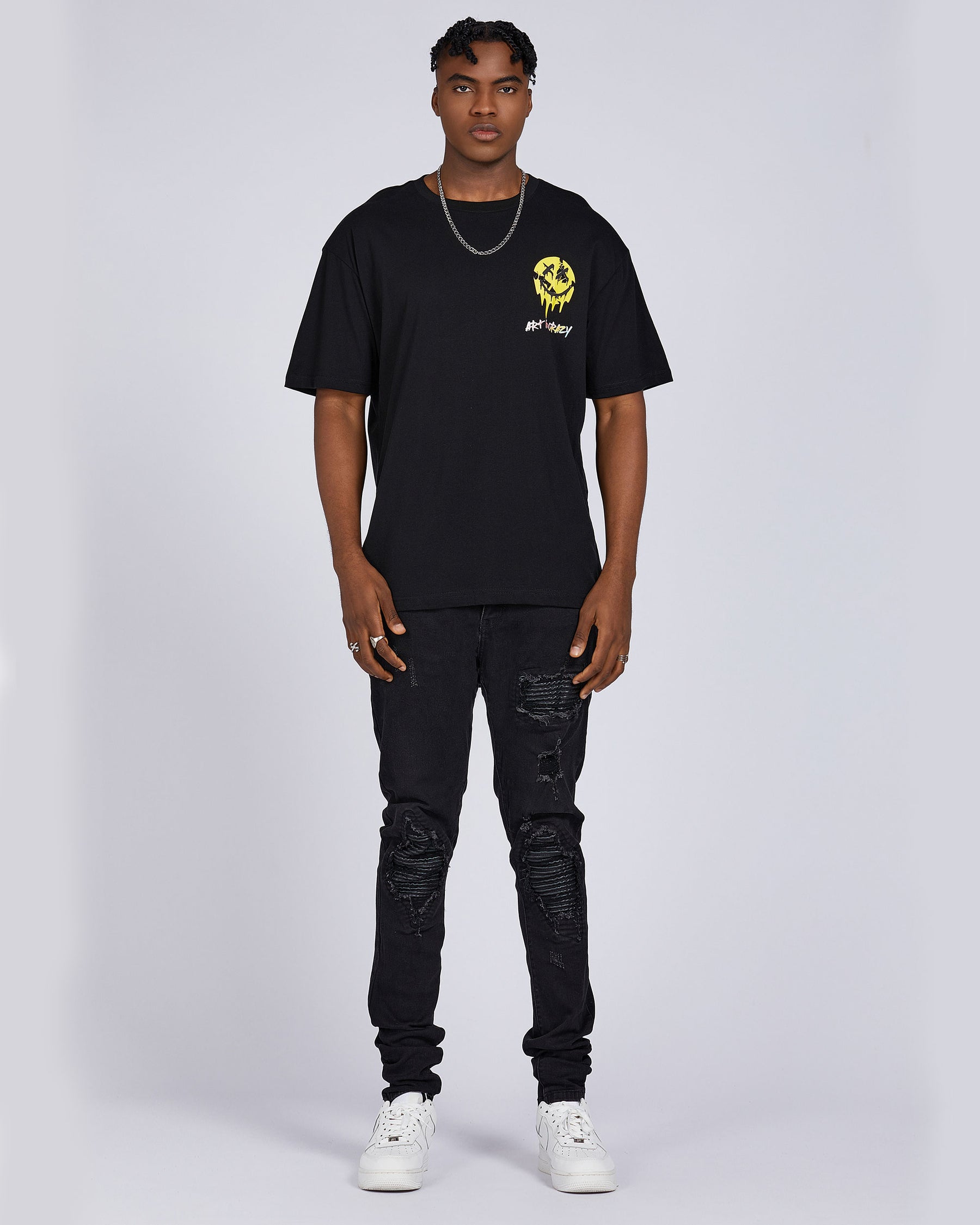 Camiseta con gráfico de cara sonriente derretida, tipografía y cita