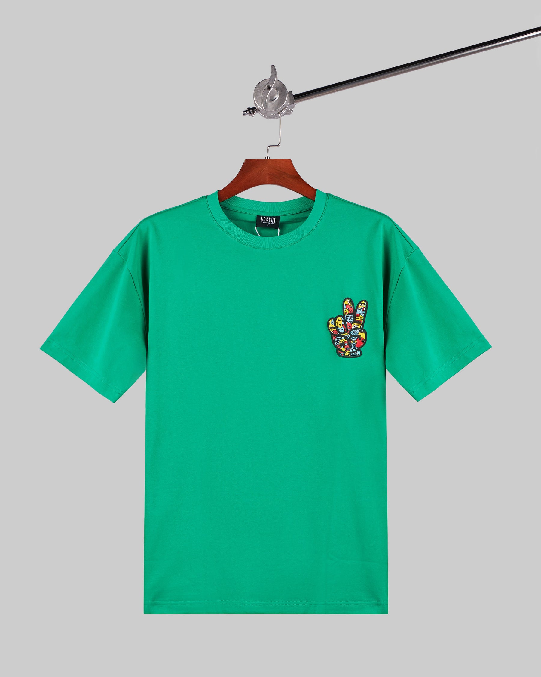 100% Cotton T-Shirt with Hand Sign Graphic and Radiating Background