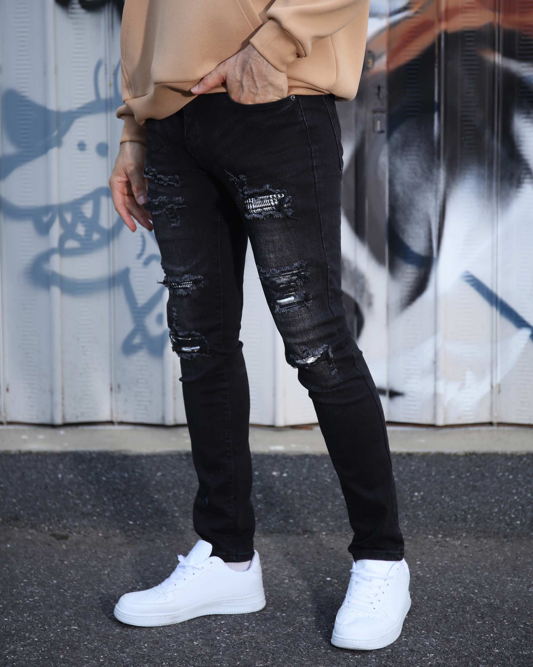 LOGEQI Black Ripped Jeans with Bold Rips and Plaid Patch