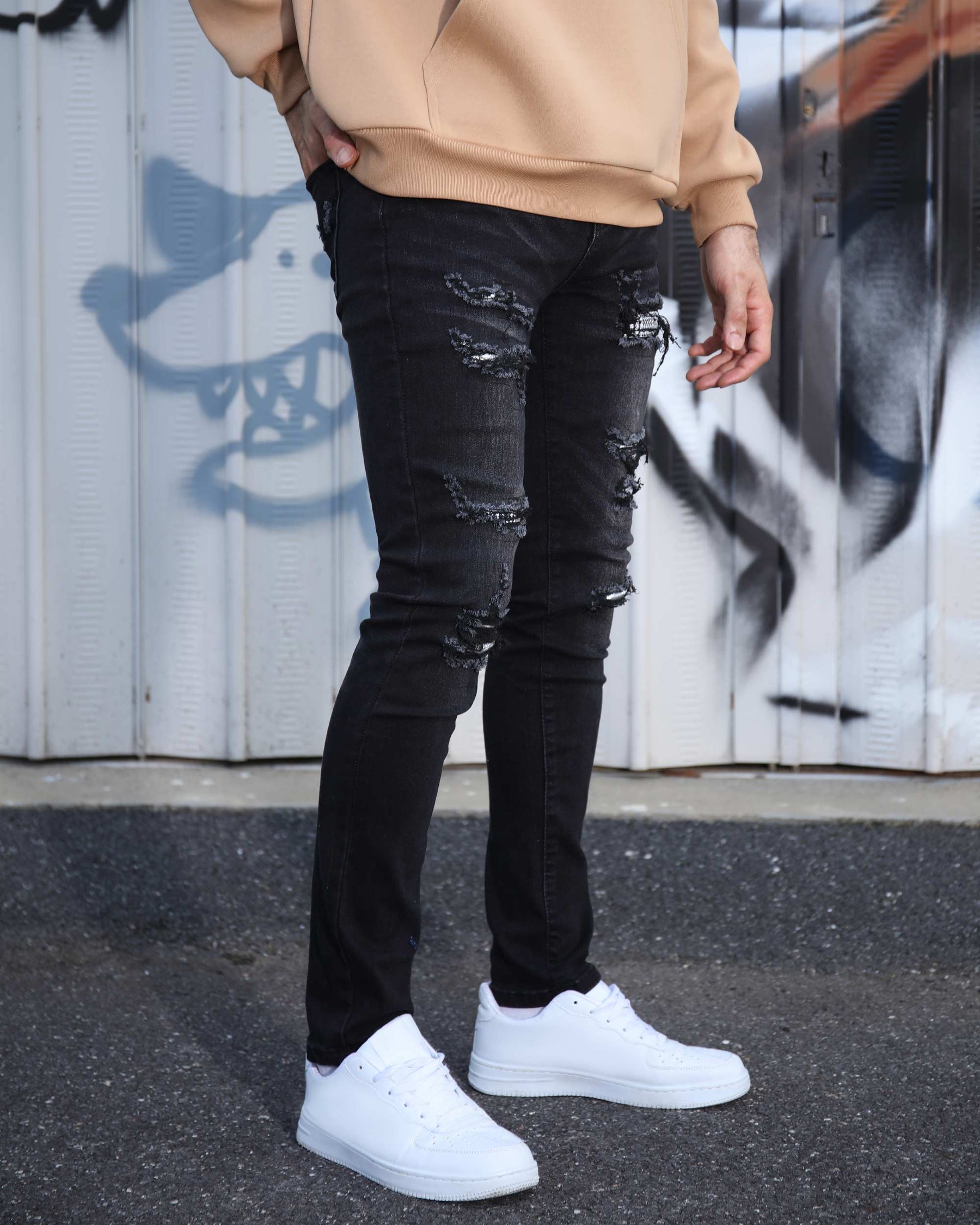 LOGEQI Black Ripped Jeans with Bold Rips and Plaid Patch