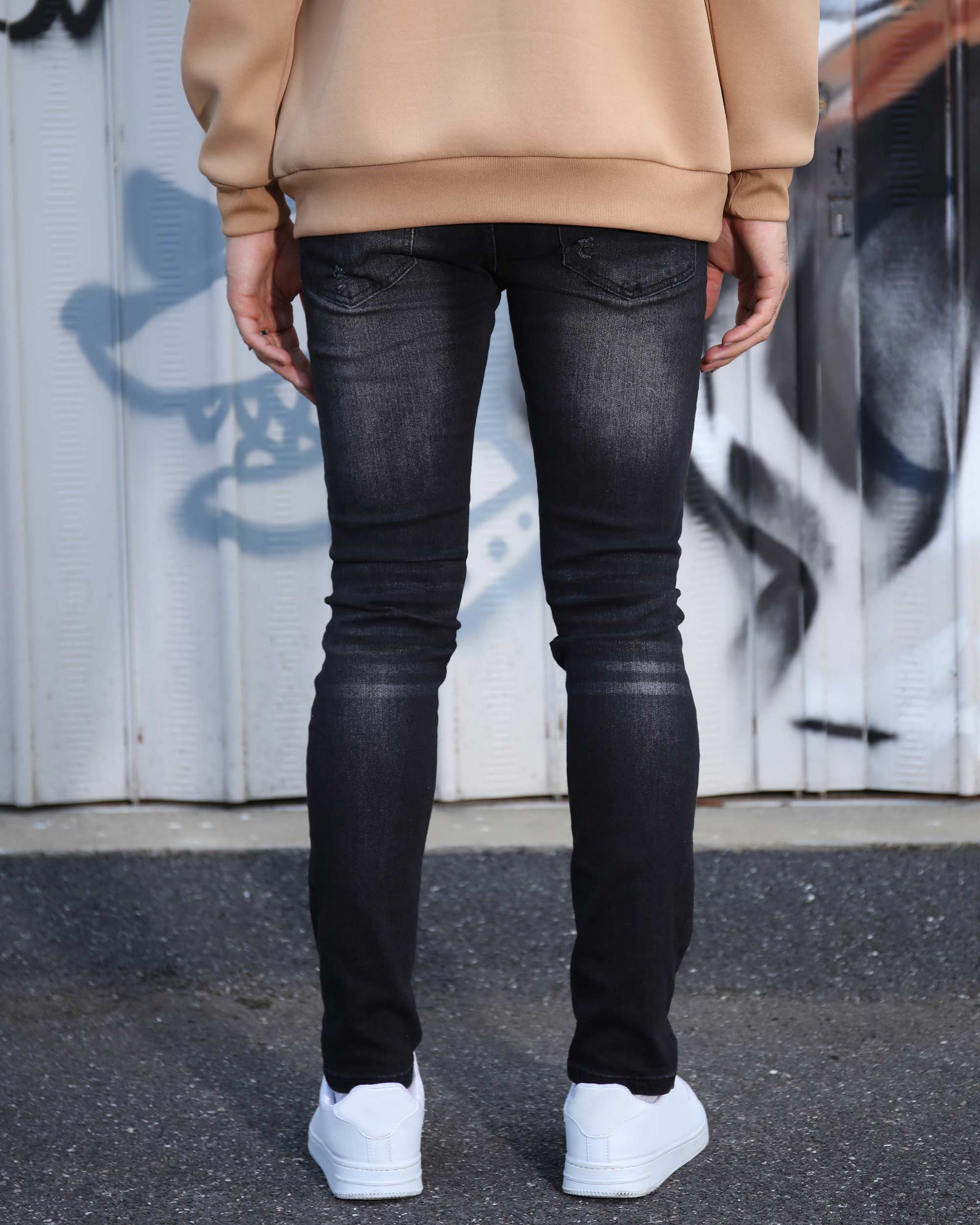 LOGEQI Black Ripped Jeans with Bold Rips and Plaid Patch