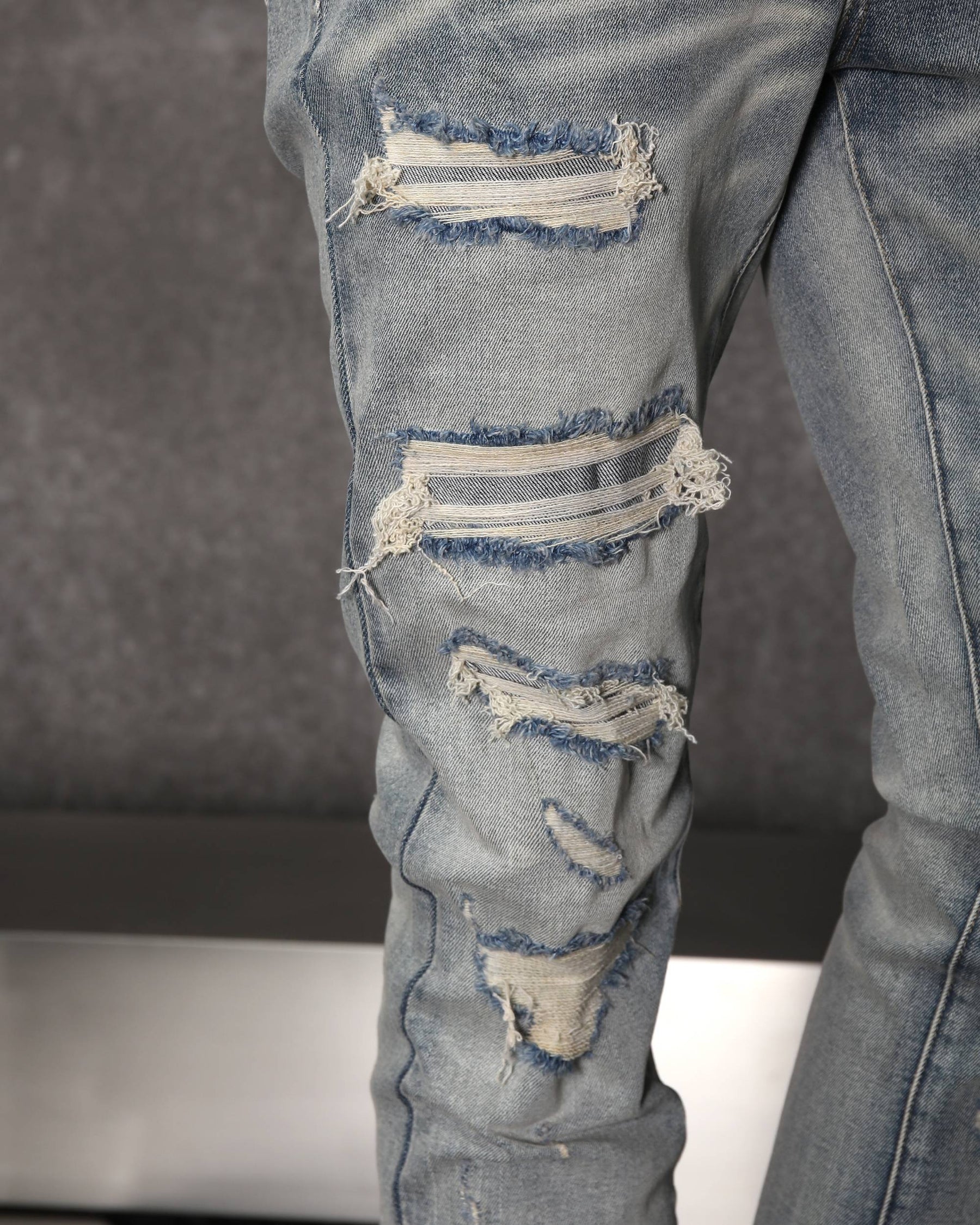 Men’s Light Wash Ripped Patched Skinny Jeans
