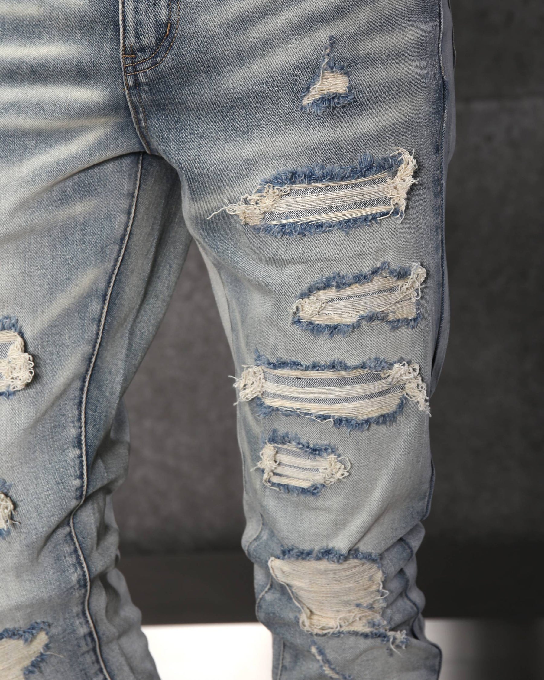 Men’s Light Wash Ripped Patched Skinny Jeans