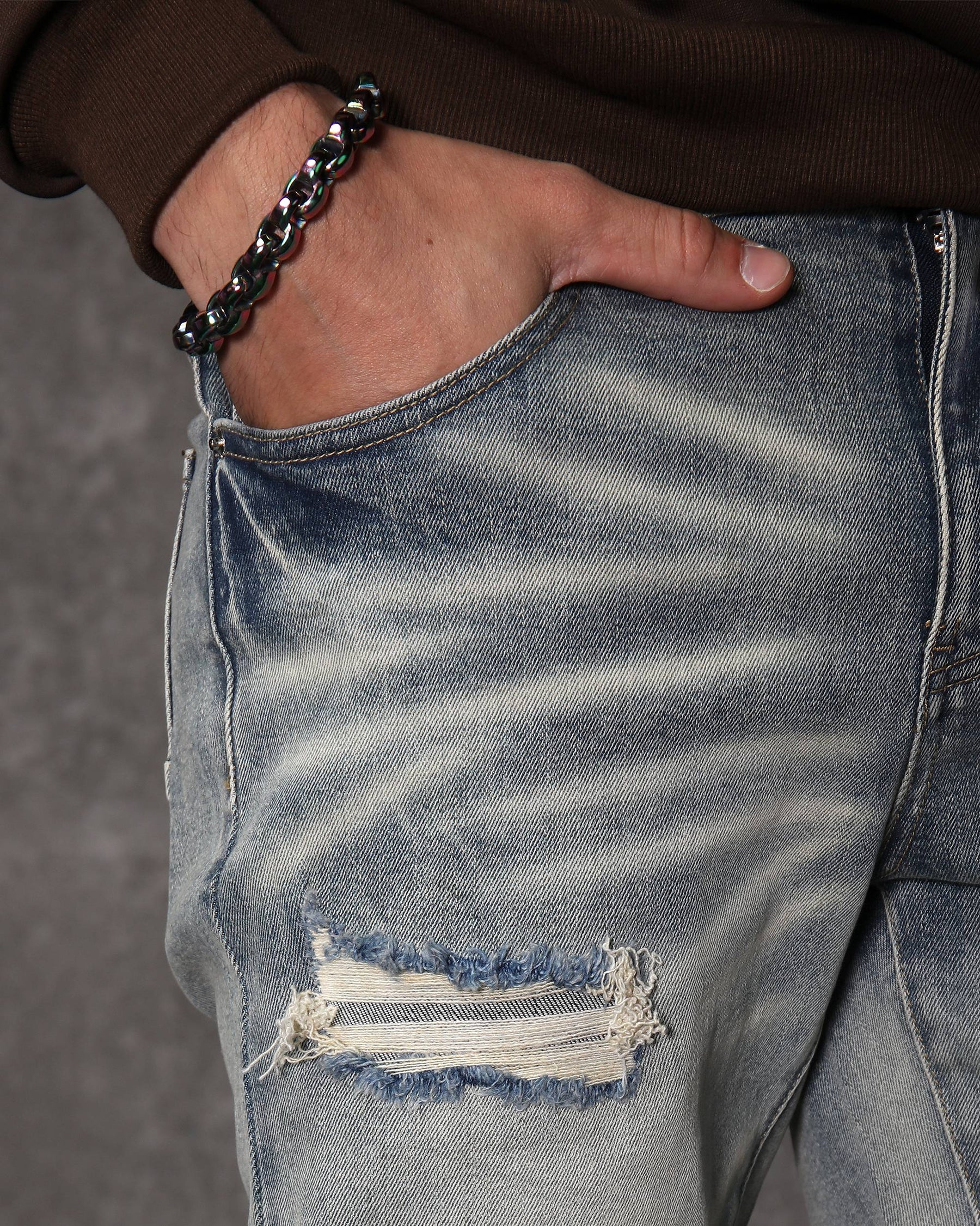 Men’s Light Wash Ripped Patched Skinny Jeans