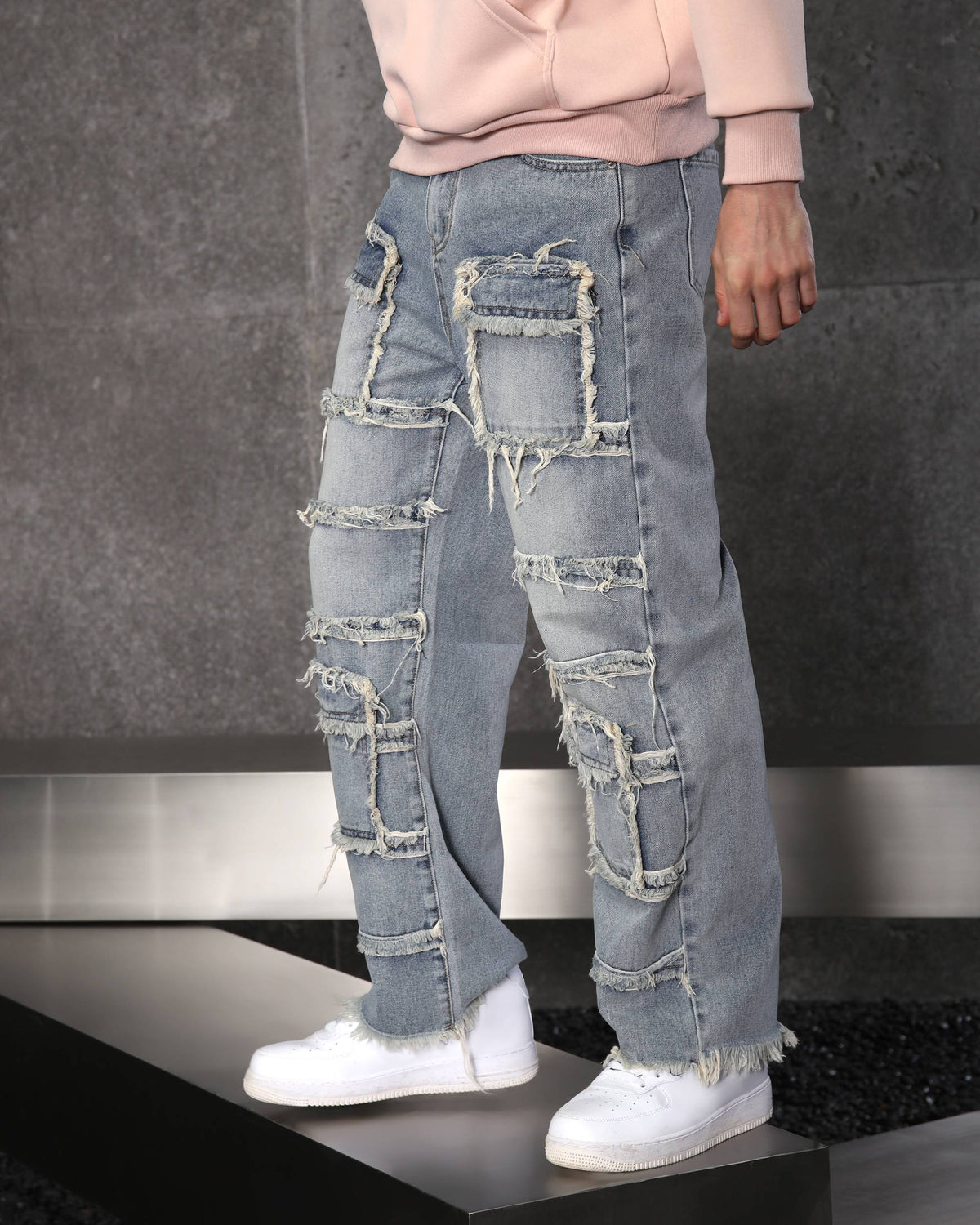 Eye-Catching Men’s Blue Heavily Distressed Patchwork Jeans