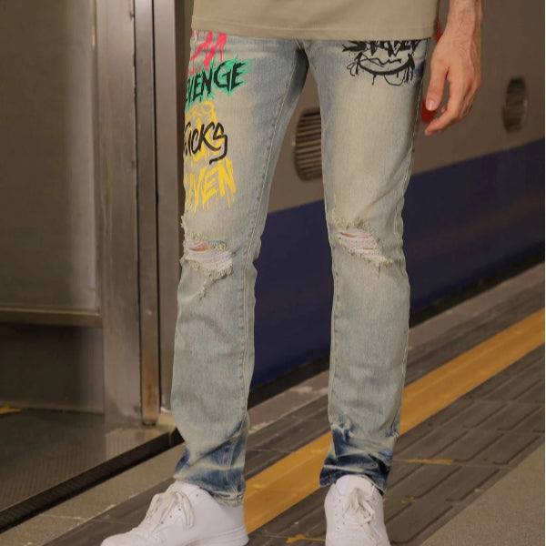 A man wearing LOGEQI's men's blue ripped straight-fit jeans with letter graffiti