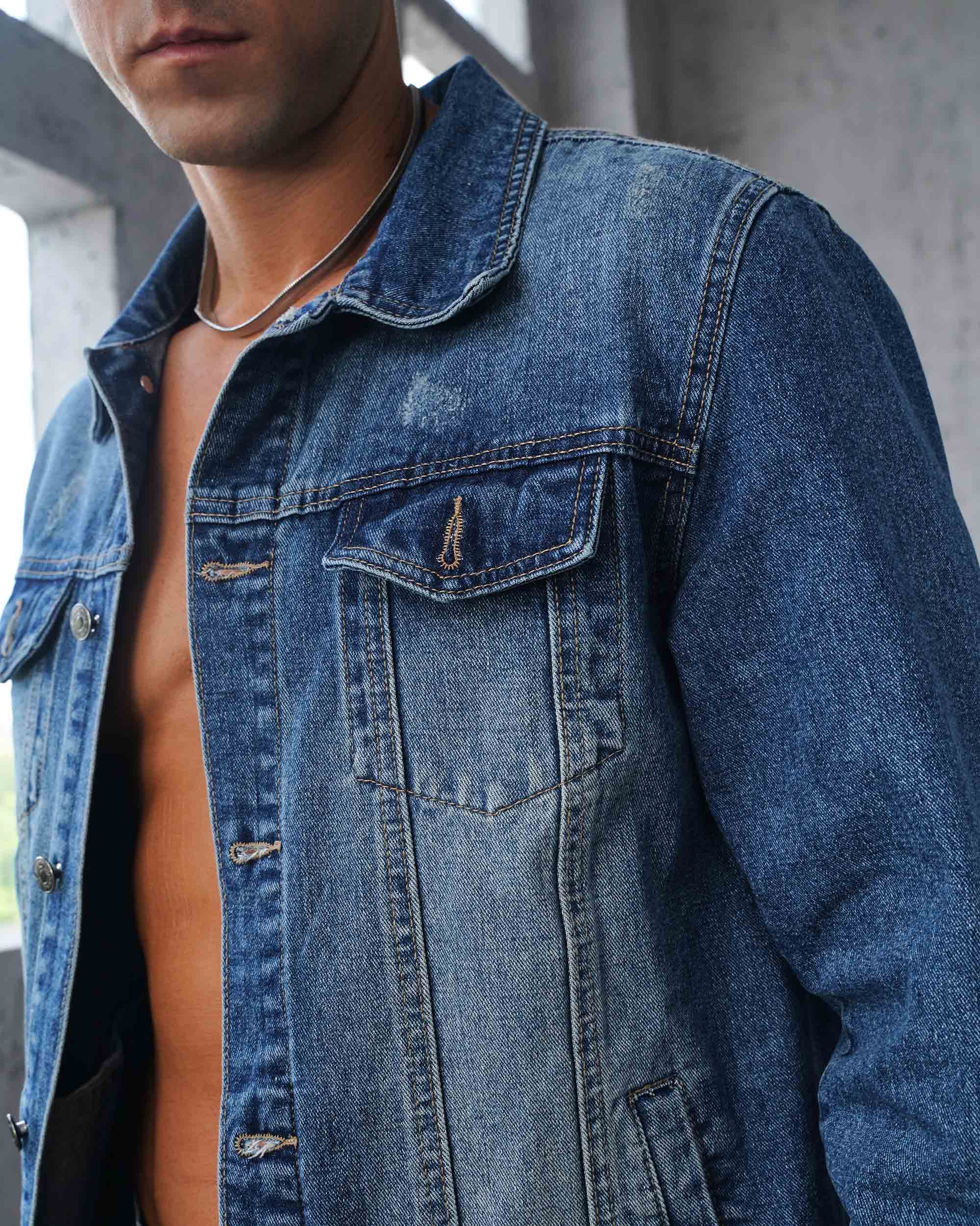 A man wearing a LOGEQI quality denim jacket