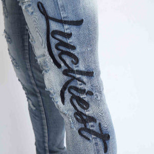 Light Wash Blue Ripped Jeans with Big Letters Embroidered