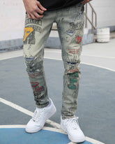Graffiti & Graphics Slim-Fit Ripped Blue Light Wash Jeans for Streetwear