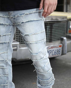 Close-up shot of LOGEQI's durable blue ripped baggy jeans for men