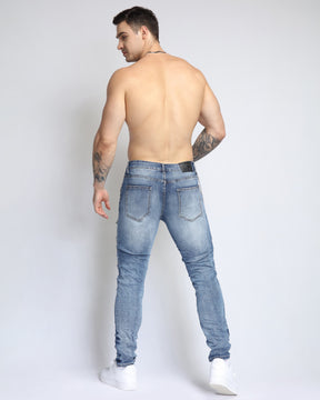 Large Ripped Blue Jeans with Green Patches