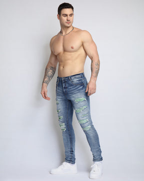 Large Ripped Blue Jeans with Green Patches