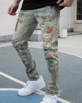 Graffiti & Graphics Slim-Fit Ripped Blue Light Wash Jeans for Streetwear