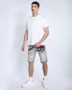 Distressed Denim Shorts with Gothic Skull Badge