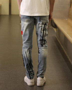 Logeqi Medium Wash Blue Ripped Jeans with Gothic Flair