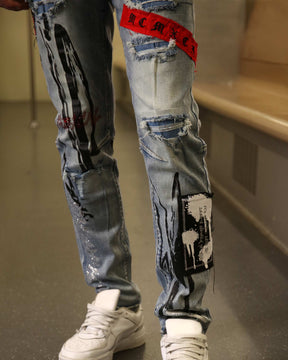 Logeqi Medium Wash Blue Ripped Jeans with Gothic Flair