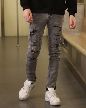 LOGEQI Gray Ripped Jeans with Graffiti-Inspired Style
