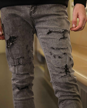 LOGEQI Gray Ripped Jeans with Graffiti-Inspired Style