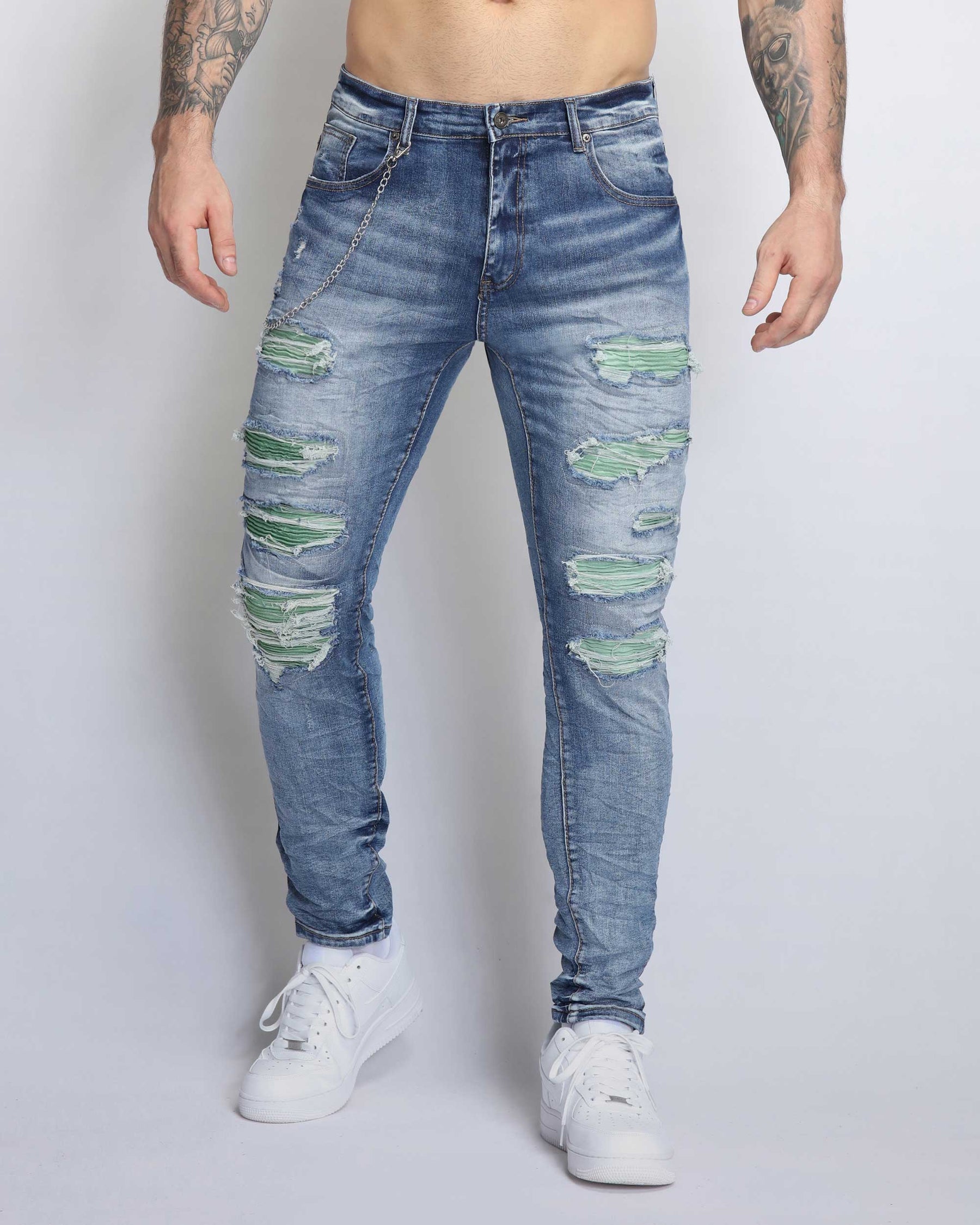 Large Ripped Blue Jeans with Green Patches