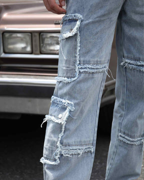 Showing the details of LOGEQI's blue ripped baggy jeans with fringes and pockets, made of durable denim




