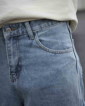 LOGEQI Fringed Ripped Baggy Jeans with a clean cut and front pockets that offer a clear and sleek look.