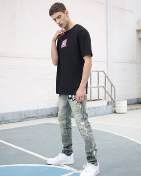 Blue Straight Leg Ripped Jeans with Graphic Print and Personalized Skull Emblem