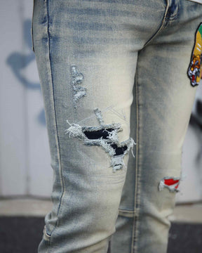 Logeqi Distressed Light Wash Blue Ripped Jeans with Lion Motif Embroider