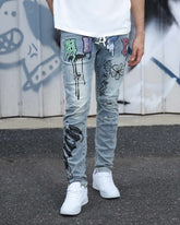 Logeqi Street Art Light Wash Blue Jeans Adorned with Painted Graffiti