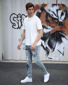 Logeqi Street Art Light Wash Blue Jeans Adorned with Painted Graffiti