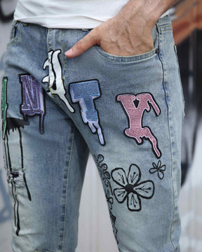 Logeqi Street Art Light Wash Blue Jeans Adorned with Painted Graffiti