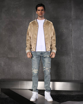 Vaqueros rotos azul claro con parches de cuadros para hombre