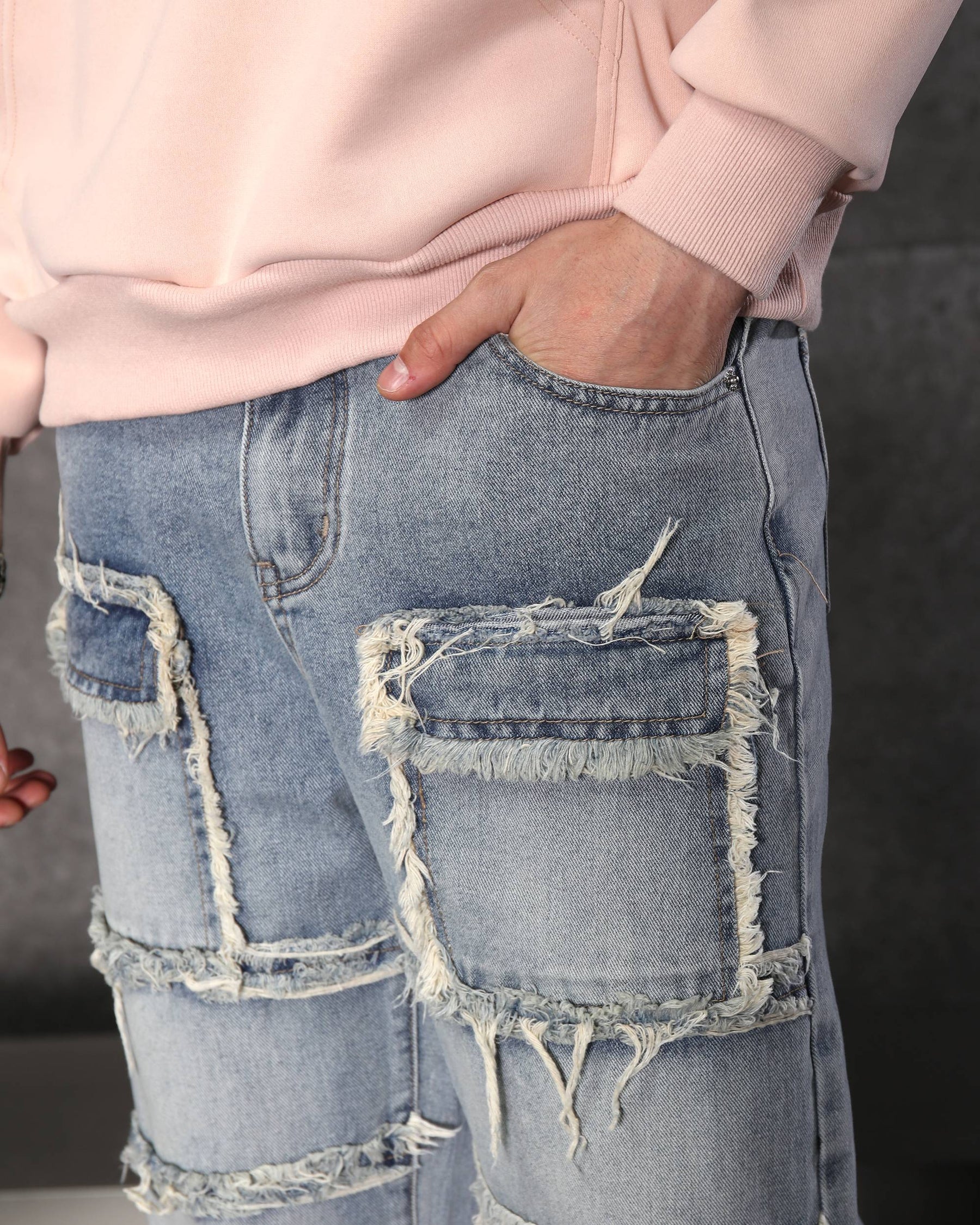 Eye-Catching Men’s Blue Heavily Distressed Patchwork Jeans