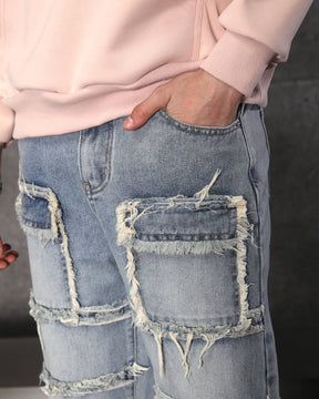 Eye-Catching Men’s Blue Heavily Distressed Patchwork Jeans