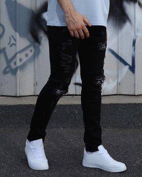 LOGEQI Hip Hop Black Ripped Jeans with Cashew Flower Patch