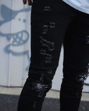LOGEQI Hip Hop Black Ripped Jeans with Cashew Flower Patch